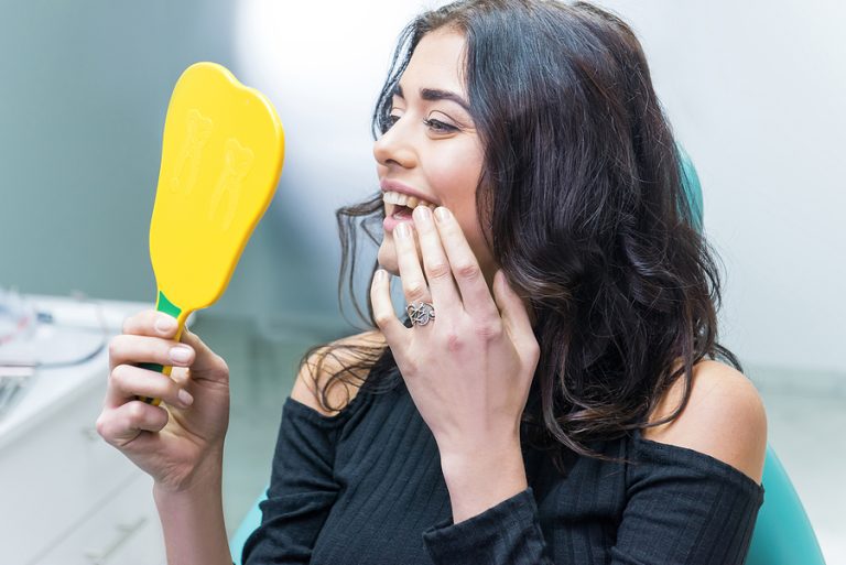 Do Dental Implants Feel Like Real Teeth? Understanding the Reality Behind the Restoration